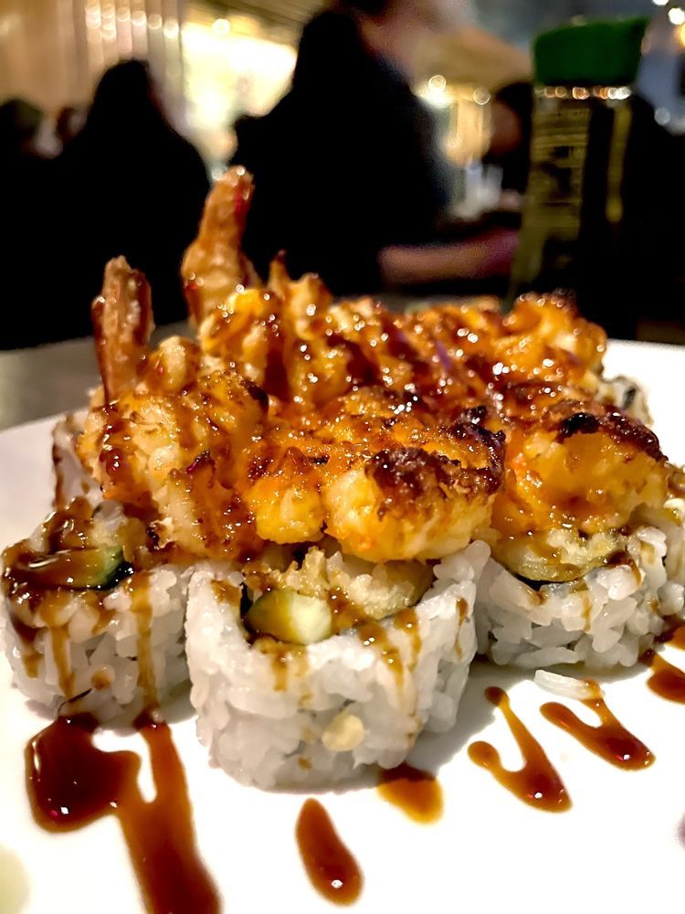 Baked Lobster Roll topped with baked lobster and eel sauce